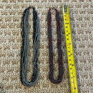 Lot of 2 beaded necklaces- black/gray and red/burgundy